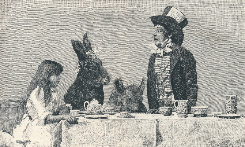 a man in a mad hatter costume talks to two rabbits and a woman